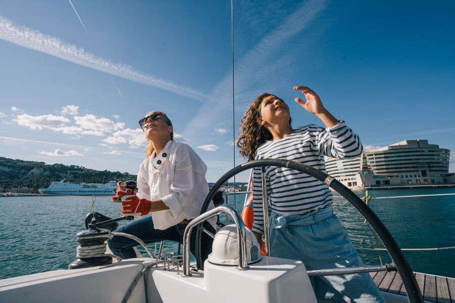 Two Hour Luxury Sailing Experience with Open Bar - Learning to raise the sails and steer