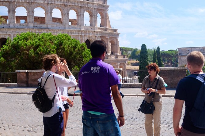 VIP Colosseum & Roman Forum Small Group Guided Tour - Walking the Roman Forum and reading its ruins