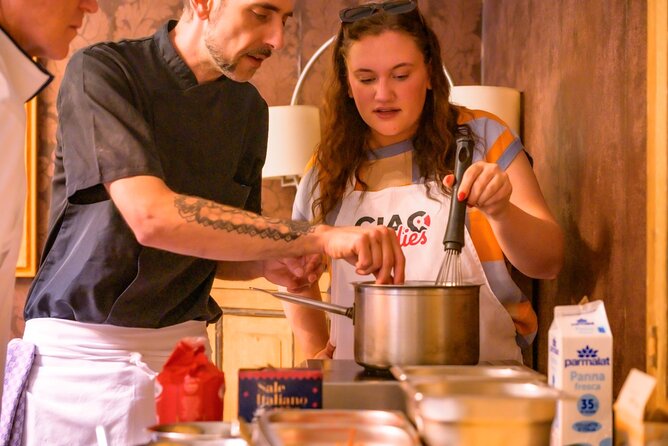 VIP Cooking Class with Carbonara, Pesto Making, Lasagna & Cannoli - Crushing basil for handmade pesto gnocchi