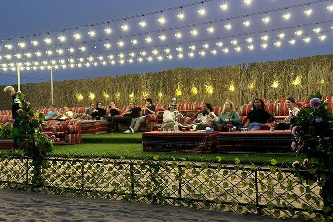 VIP Desert Safari Abu Dhabi with Private Seating Area - Falcons, Arabic dress, and photo opportunities