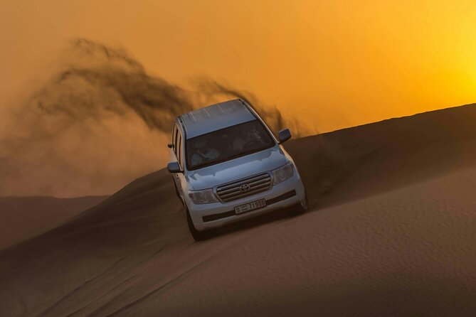 VIP Desert Safari Camel Ride Sand Boarding & BBQ Dinner - Red dunes, fast wheels, and a sunset camel ride