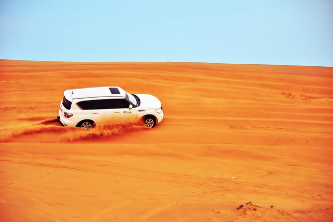 VIP Desert Safari & Dune Bashing with 5<em> Live BBQ – Key points to know before booking’ /></p>
<ul>
<li><strong>A full afternoon and evening:</strong> Plan on about 6 to 7 hours, beginning around 3 pm and ending late in Dubai.</li>
<li><strong>Several desert activities included:</strong> Dune bashing, sand boarding, a short camel ride, sunset photography, henna for ladies, and falcon photos are part of the package.</li>
<li><strong>Quad biking is optional:</strong> You receive it only if you select that option when booking.</li>
<li><strong>A guide-driver matters:</strong> Ahmad T. is specifically praised for being kind, good with families, and entertaining behind the wheel.</li>
<li><strong>Dinner comes with live shows:</strong> The camp serves a buffet BBQ with soft drinks, belly dancing, a fire show, and Tanoura dancing.</li>
<li><strong>Think about comfort and ethics:</strong> Dune bashing is not suitable for pregnant women or people with back pain, and the camel setup may concern some visitors.</li>
</ul>
<h2>Leaving Dubai for the Al Belaida dunes</h2>
<p><img width="669" height="446" decoding="async" src=