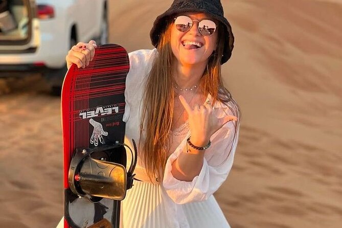 VIP Desert Safari with 4x4 pick up & drop, camel ride bbq dinner - Sunset photographs across the red Arabian Desert