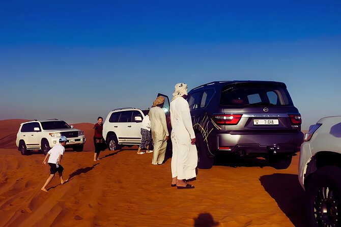 Vip Dubai Desert Safari with Camel Riding,BBQ Dinner - Sandboarding and the Sunset Photo Stop
