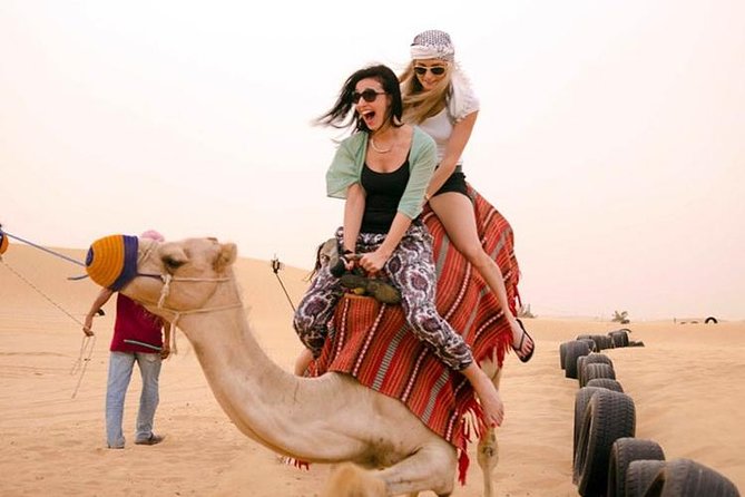 VIP Dubai Desert Safari with Dinner served at table and 3 live Shows - Dune bashing across the rolling sand