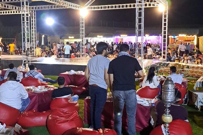 VIP Dubai Desert Safari with Quadbike,Sandboarding & BBQ dinner - Tanura, fire, and belly dancing