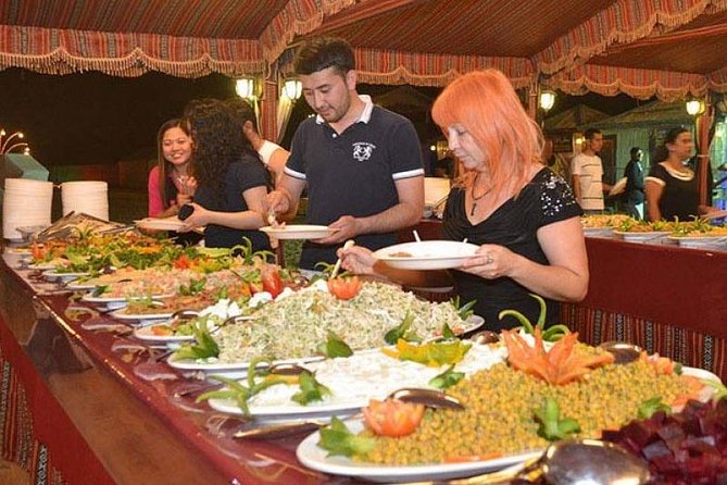 Vip evening Desert Safari pickup and drop by Land Cruiser - Sandboarding, henna, and camp activities