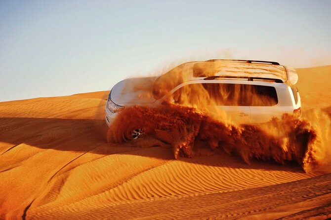 Vip Evening Desert Safari with quad bike,Camel Riding & Dinner - From Dubai streets to Lahbab’s red dunes