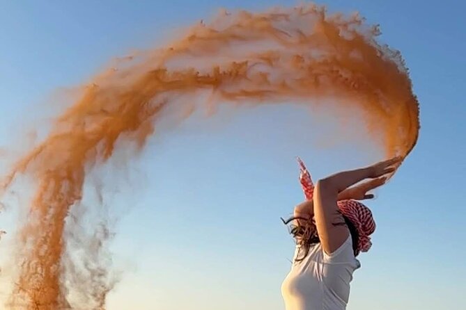 Vip Evening Desert Safari with quad bike,Camel Riding & Dinner - Sandboarding and the sunset photo stop