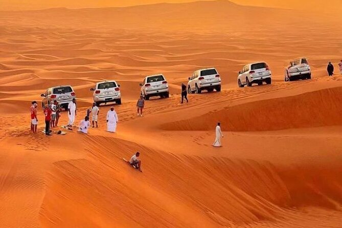 VIP Service | Red Dunes Sunset Desert Safari With BBQ Dinner - The dune stop: sunset photos and sandboarding