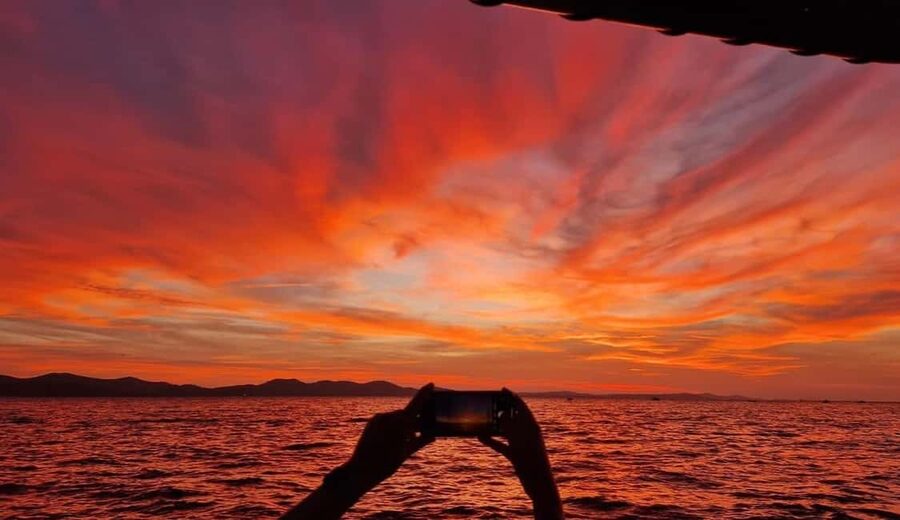 Zadar: Romantic Luxury Sunset Boat Tour with Aperol Spritz - Leaving Foša, Zadar’s historic harbor